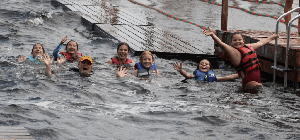 Ontario Summer camp- girls smiling in water